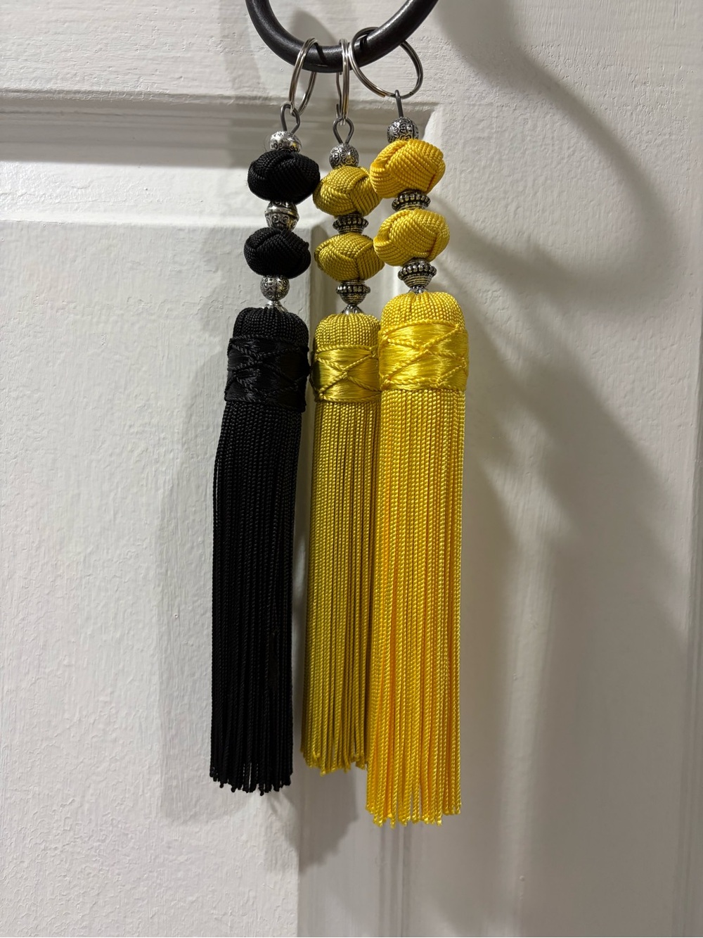 Set of Decorative Tassel Keychains in Black, Bright Yellow and Gold - Picture 1 of 1